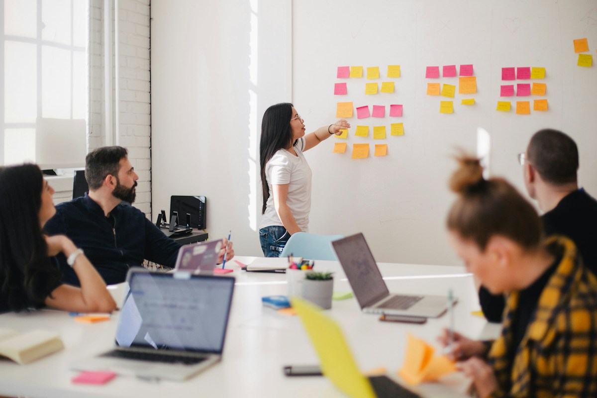Agency and client teams sharing ideas, frameworks, and practical knowledge